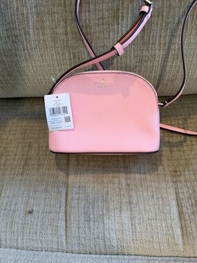 Kate Spade Pink small domed Crossbody Crossbody Bag Saffiano 7 1/2 by 6 new